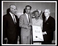 Dr. Vada Somerville receives an award from County Supervisor Kenneth Hahn, Los Angeles, 1960s