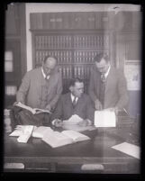 Jess Hession and lawyers around a desk, Inyo County, 1924-1927