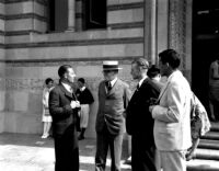 Dedication ceremony - Ernest C. Moore talking with three ASUCLA officers, 1930