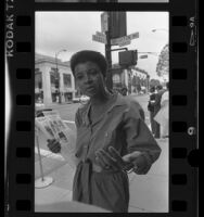 Margaret Prescod of Black Coalition Fighting Back Serial Murders handing out flyers about the Southside Slayer on Rodeo Drive in Beverly Hills, Calif., 1986