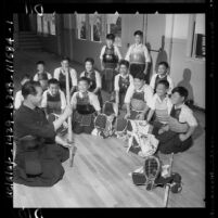 Torao Mori teaching Centinela Valley Japanese youngsters rudiments of kendo in Lawndale, Calif., 1958