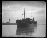 Full length view of ship, Freeport Sulphur No.6, carrying Phil Alguin entering Brazos River