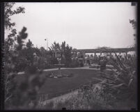 Golfers waiting around the putting greens at the California Country Club, Culver City, 1921