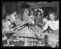 Women packing lemons at packing house in Fallbrook, Calif., 1949