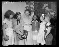 Joan Allin and her children greet their Hopi guests for vacation