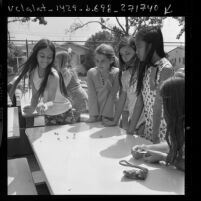 Luisa Ranieri and others competing in jacks game tournament at Atwater Elementary School in Los Angeles, Calif., 1972