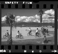 Cyclists on the bike path along Venice and Santa Monica Beach, Calif., 1972