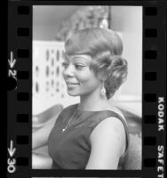 Woman modeling African American hairstyle, 1972