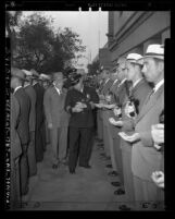 C. B. Horrall, Los Angeles police chief, inspecting detective division, Los Angeles, circa 1947