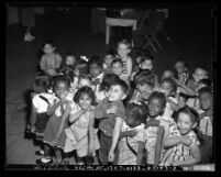 Children after receiving smallpox vaccinations at Ann Street School in Los Angeles, Calif., 1949