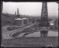 Oil wells and holding tanks, Montebello, circa 1921