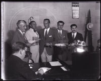 Joseph Ford, Leonard Wilson, and David H. Clark in courtroom at Clark's arraignment, Los Angeles, 1931