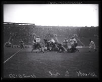 Football mid-play action, U.S.C. vs. Drake at the Coliseum, Los Angeles, 1927