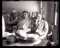 Frank Keaton seated next to Detective lieutenant Romero at his murder trial in Los Angeles, 1930