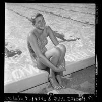 13-year-old swimmer, Tauna Vandeweghe poolside in Culver City, Calif., 1973