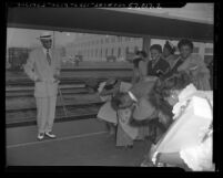 James Francis Marion Jones, (aka Prophet Divine) of Detroit being greeted at Los Angeles Union Station, Calif., 1952