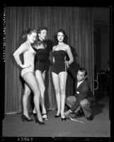 Comedian Eddie Cantor with beauty contestants Lisa Davis, Barbara Drake and Phyllis Applegate, Los Angeles, Calif., circa 1954