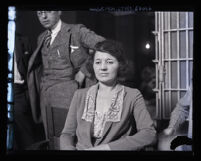 Clara Phillips sitting near jail cell at police station in Los Angeles, Calif., 1922