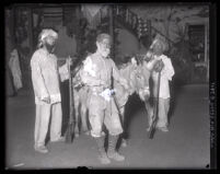 Scene Six from "First Californians" pageant depicting frontiersmen and gold prospectors, Ontario, 1929