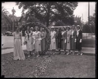 Engaged members of USC's Tri-Delta Sorority passing through Pansy Ring, Los Angeles, 1931