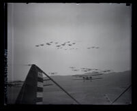 Army Air Corps planes doing aerial maneuvers over California, Burbank, 1930