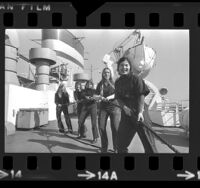 Five women cadets working aboard the California Maritime training ship Golden Bear in Long Beach, Calif., 1974