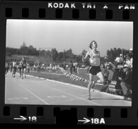 Runner Rick Wohlhuter crossing the finish line at the 86th National Amateur Athletic Union track and field championships in Los Angeles, Calif., 1974