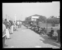 Job seekers waiting outside Chrysler plant in Los Angeles, Calif., 1954