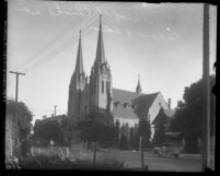 Exterior view of a Episcopal Church and street at Hoover and Adams Street in Los Angeles, Calif. circa 1923