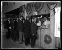 Line of unemployed men getting meals at dining hall run by Aimee Semple McPherson, 1932