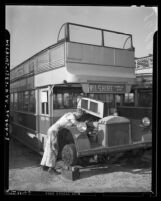 Mechanic working on double-decker Los Angeles transit bus Los Angeles, Calif., circa 1941