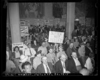 Group of demonstrators sitting in at Los Angeles County Supervisors meeting of the California State Relief Administration, 1941