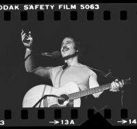 Paul Simon performing at Santa Monica Civic Auditorium, Calif., 1975