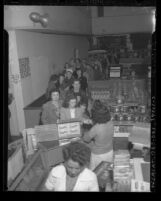Customers waiting to purchase margarine at Boys Market during Oleo margarine shortage, Los Angeles, 1945