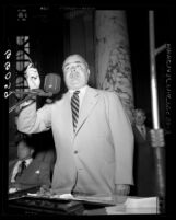 Los Angeles City Councilman Ed Davenport speaking during debate on requiring Communists to register, 1950