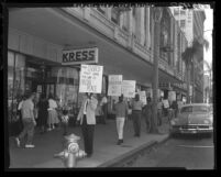 Pickets march in front of Kress Store in protest of firm's refusal to serve blacks in Pasadena, Calif., 1960