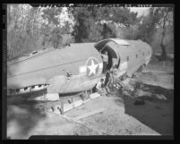 Surplus military cargo plane being transformed into a home in Riverside, Calif., 1947