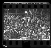 Crowd lining Santa Monica Blvd. during clash between Pro-Iranian and Anti-Iranian demonstrators in Los Angeles, 1979