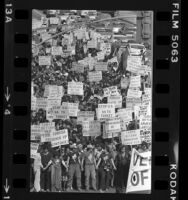 People carrying signs on march commemorating the 65th anniversary of the Armenian Massacre, Los Angeles, Calif., 1980