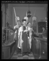 Benjamin Gorelik, Henry Glicksberg, and Sam Rosen take part in Succoth rites, 1948