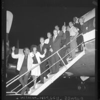 Entertainers boarding plane for Washington D.C. civil rights march, Los Angeles, Calif., 1963