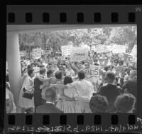 Anti-segregation marchers join hunger strikers in courtyard of Los Angeles Board of Education, 1963