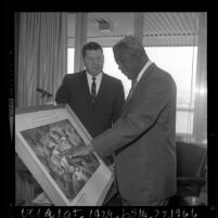Jackie Robinson with LA County Supervisor Warren Dorn inspecting rendering of Jackie Robinson Park, Calif., 1963