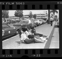 Three Canadians enjoying the sun at Los Angeles International Airport, 1978