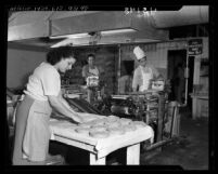 Gutierrez family making tortillas in their tortilleria in Los Angeles, Calif., 1947
