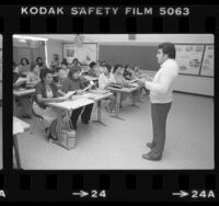 Rafael Franco conducting English skills class to Spanish speaking parents in the Norwalk School District, Calif., 1981