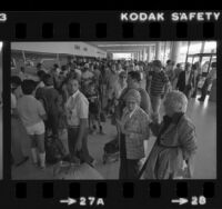 Passengers waiting in check-in lines at Los Angeles International Airport, Calif., 1981