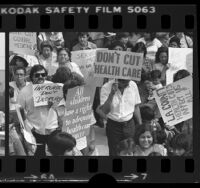 Demonstrators protesting health care cuts outside Board of Supervisors hearing in Los Angeles, Calif., 1981