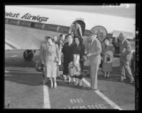 Seven Northern California Communist leaders, indicted by U.S. grand jury arrive at Los Angeles International Airport in 1951