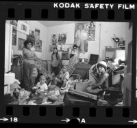 Sabina de la Cruz with her children in a Skid Row hotel in Los Angeles, Calif., 1983